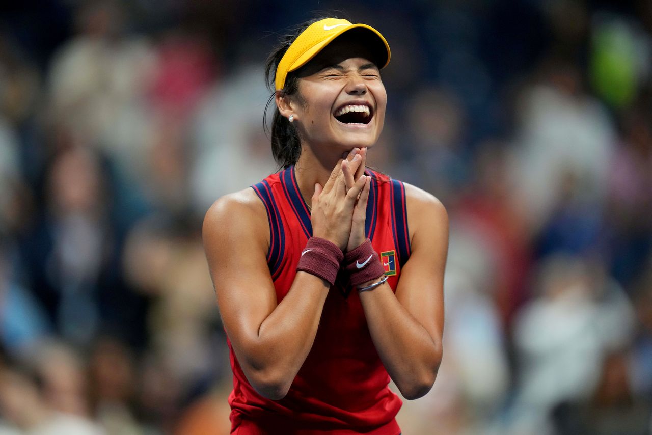 FILE PHOTO: Sep 9, 2021; Flushing, NY, USA; Emma Raducanu of Great Britain celebrates after match point against Maria Sakkari of Greece (not pictured) on day eleven of the 2021 U.S. Open tennis tournament at USTA Billie Jean King National Tennis Center. Mandatory Credit: Danielle Parhizkaran-USA TODAY Sports/File Photo     TPX IMAGES OF THE DAY SEARCH "POY SPORTS" FOR THIS STORY. SEARCH "REUTERS POY" FOR ALL BEST OF 2021 PACKAGES