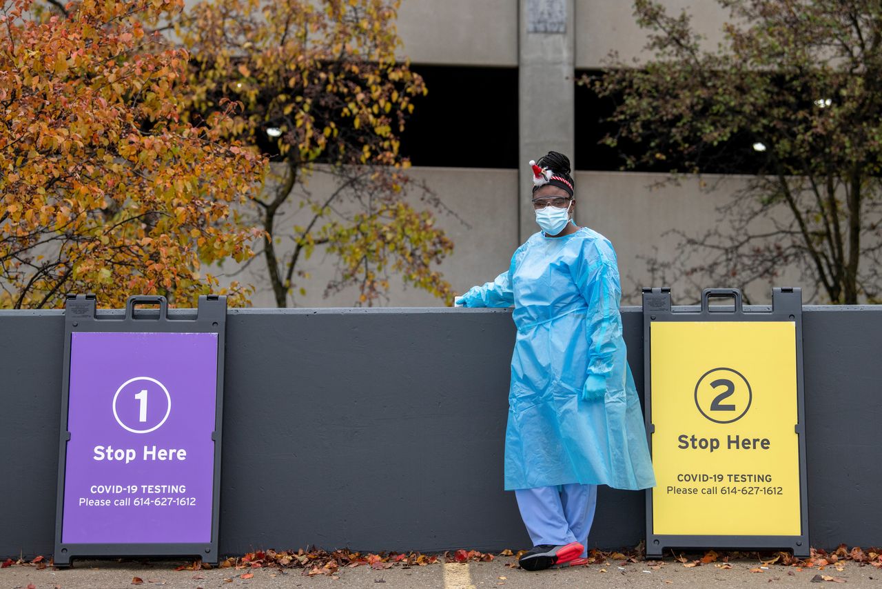 FILE PHOTO: Medical assistant Desiree Neal poses for a portrait at a drive up testing site for people presenting with coronavirus disease (COVID-19) symptoms in Columbus, Ohio, U.S., December 2, 2021. REUTERS/Gaelen Morse