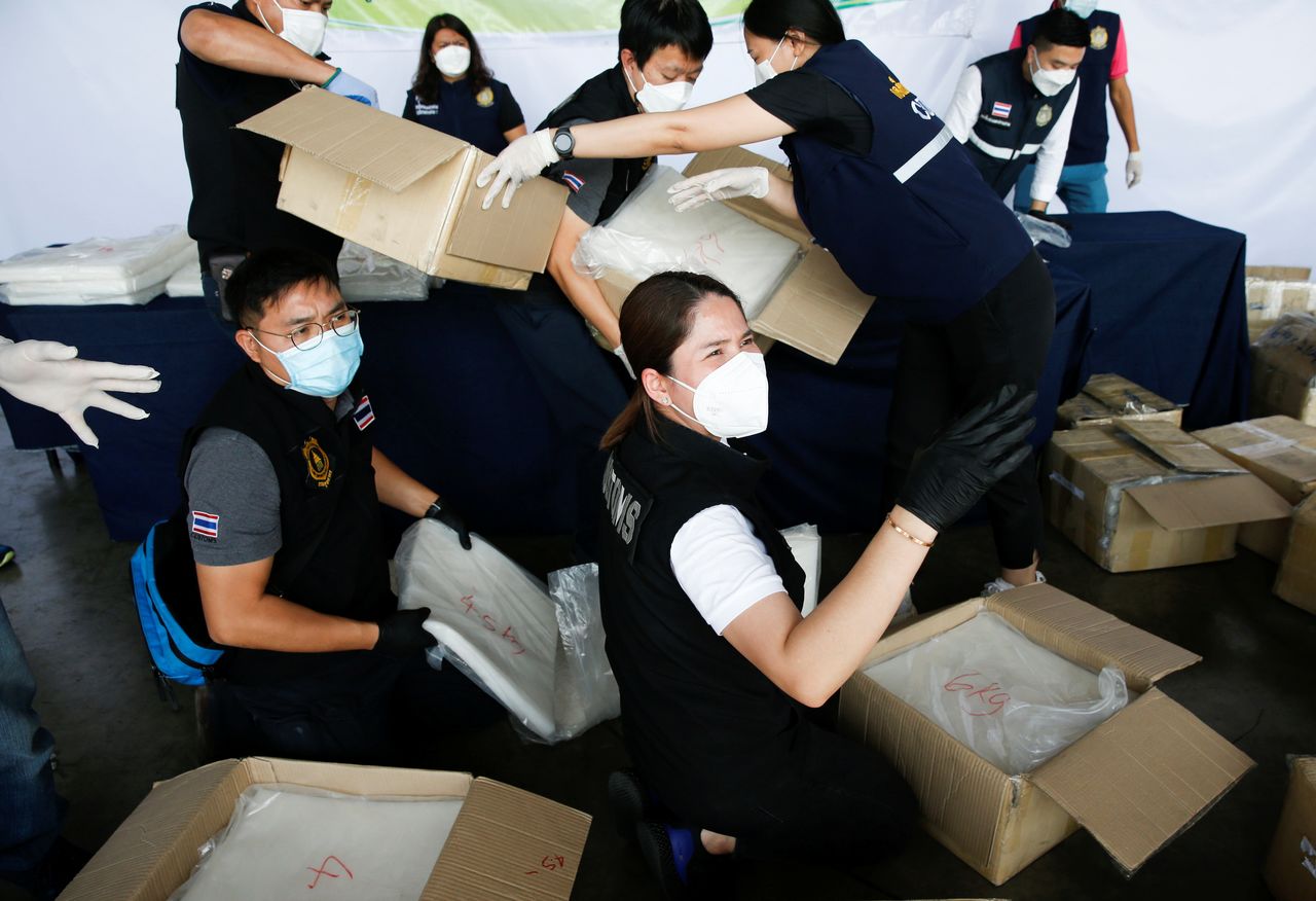 Thai authorities repack machines after the test as they seized 897 kilograms of crystal methamphetamine worth 2.7 billion baht ($79,733,079) after Thai customs intercepted packages headed for Taiwan, in Bangkok, Thailand December 4, 2021. REUTERS/Soe Zeya Tun