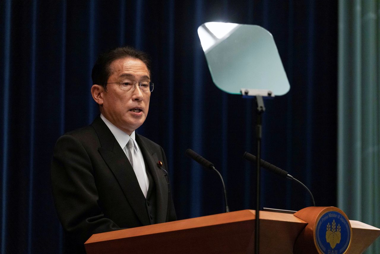 FILE PHOTO: Japanese Prime Minister Fumio Kishida speaks during his press conference, after the parliament re-elected him as prime minister following an election victory last month by his ruling Liberal Democratic Party, in Kantei, Japan November 10, 2021. Stanislav Kogiku/ Pool via REUTERS
