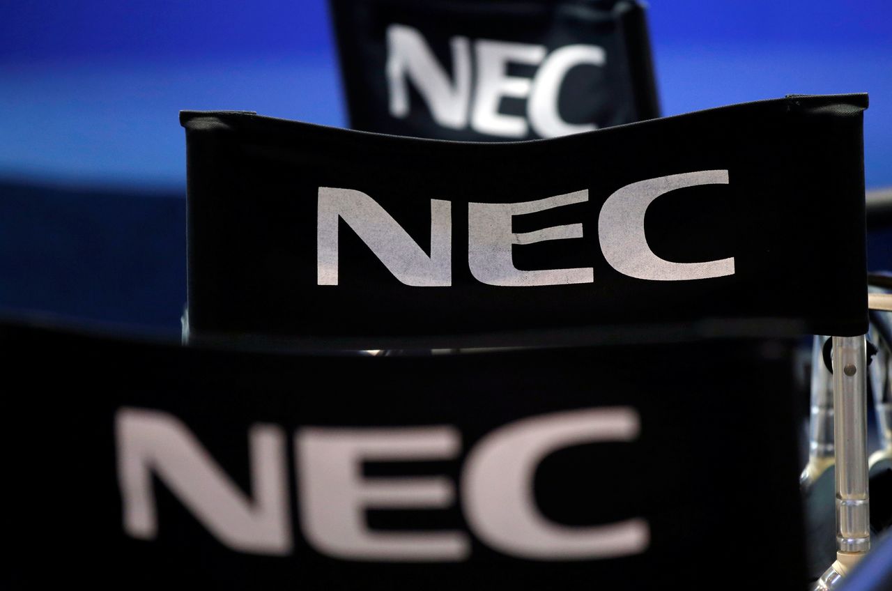 FILE PHOTO: Logos of NEC Corp are pictured at CEATEC (Combined Exhibition of Advanced Technologies) JAPAN 2016 at the Makuhari Messe in Chiba, Japan, October 3, 2016.   REUTERS/Toru Hanai