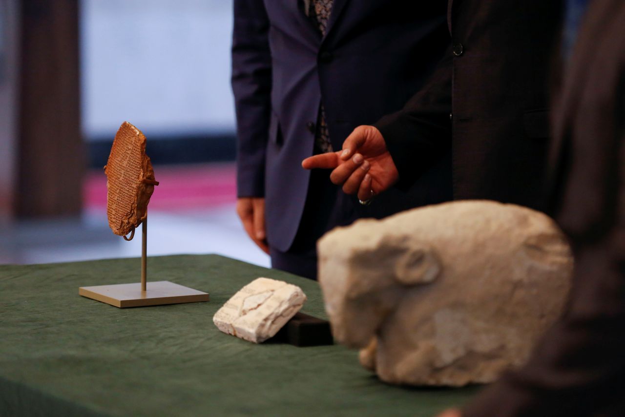 The Gilgamesh Dream Tablet, stolen from Iraq in 1991 and returned after it was seized by the U.S. government, and other artefacts are displayed at the Ministry of Foreign Affairs in Baghdad, Iraq December 7, 2021. REUTERS/Saba Kareem
