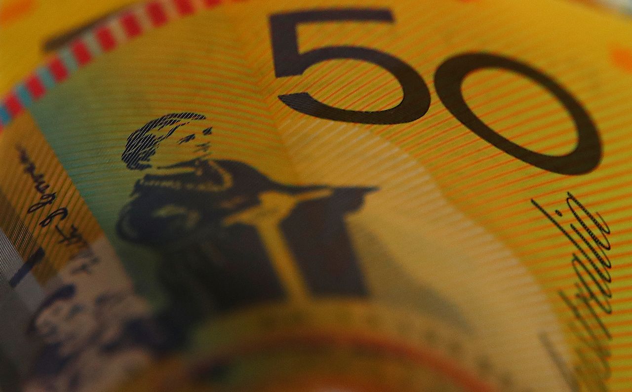 FILE PHOTO: Australian dollars are seen in an illustration photo February 8, 2018. REUTERS/Daniel Munoz