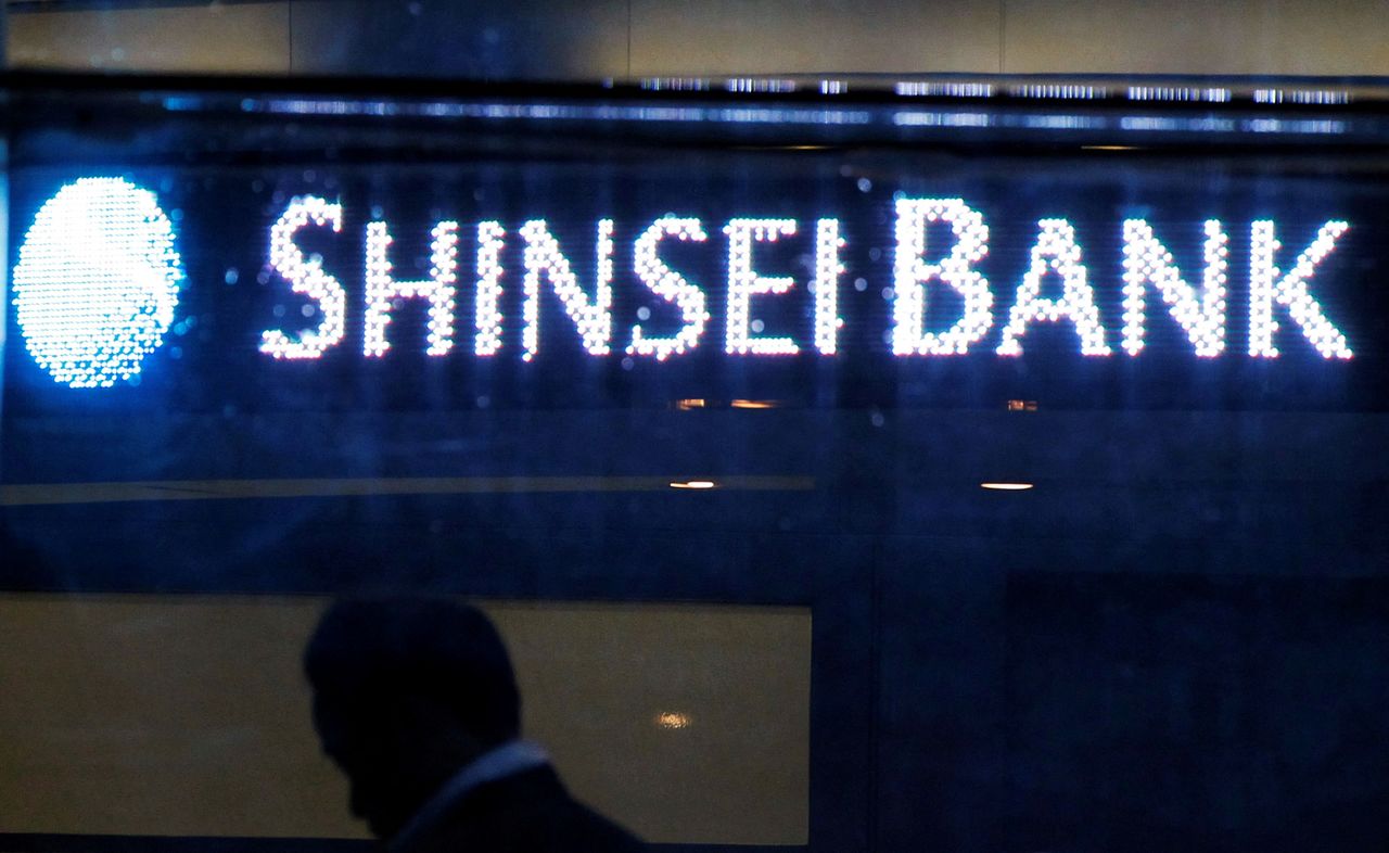 FILE PHOTO: The Shinsei Bank logo is pictured at the lobby of the bank in Tokyo, Oct. 22, 2010. REUTERS/Yuriko Nakao/File Photo