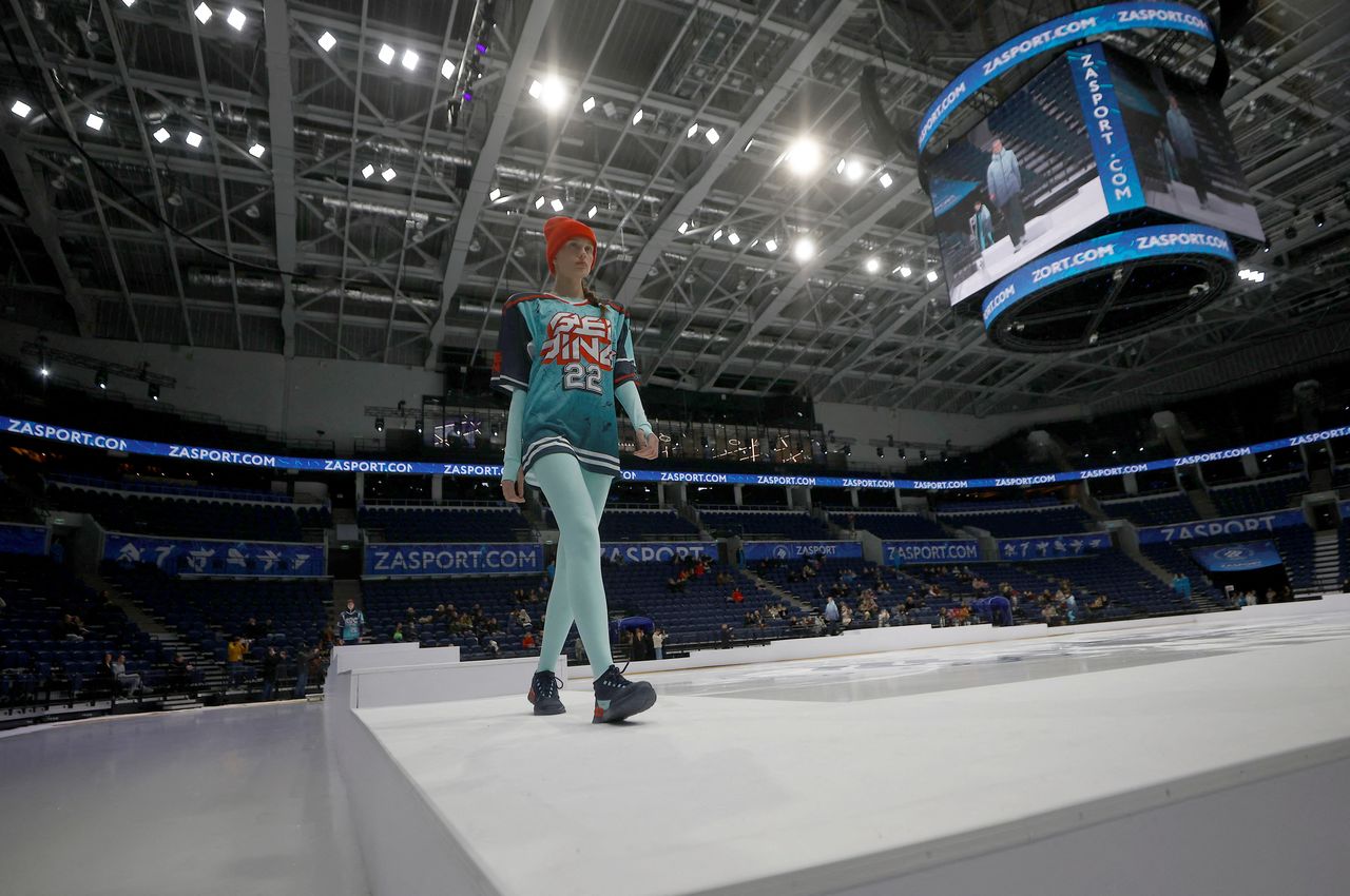 A model presents one of the uniforms of the Russian Olympics athletes designed by ZASPORT, the official clothing supplier for Russian athletes competing in the 2022 Winter Olympics in Beijing, during a presentation in Moscow, Russia December 10, 2021. REUTERS/Maxim Shemetov