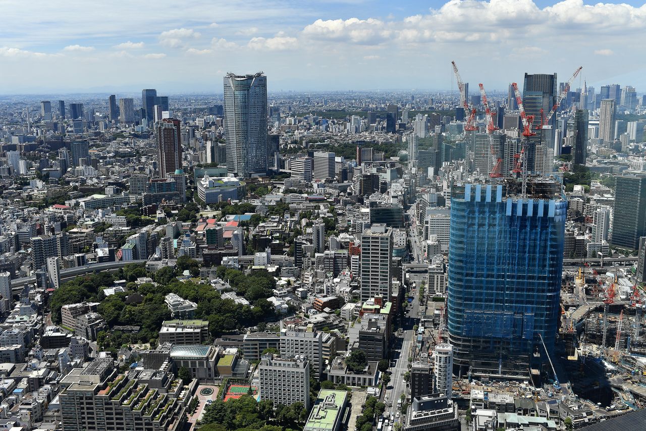 FILE PHOTO: Buildings under construction are seen in a general view from Tokyo Tower of the city of Tokyo, Japan, August 6, 2021. Picture taken August 6, 2021. REUTERS/Clodagh Kilcoyne