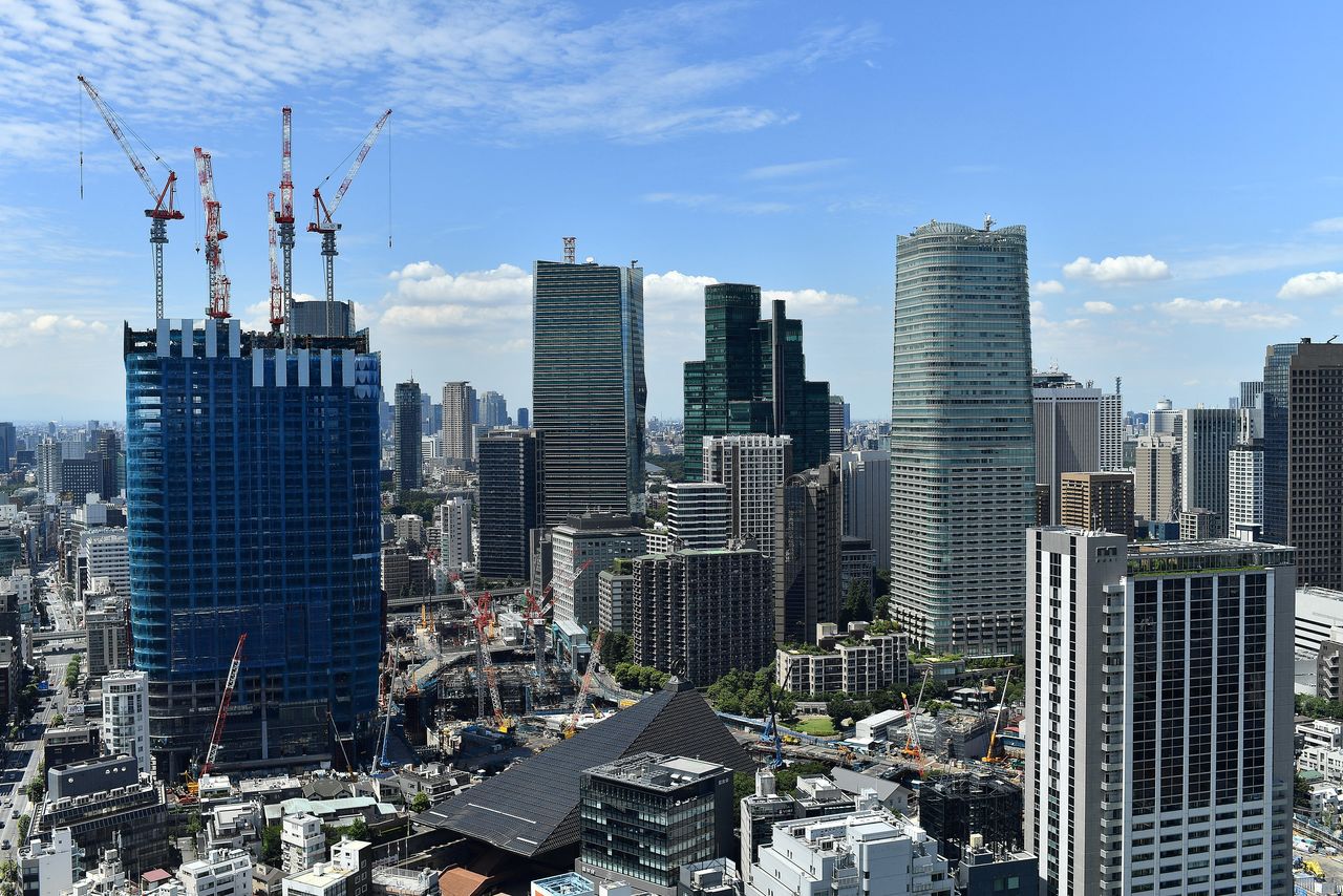 FILE PHOTO: Buildings under construction are seen in a general view from Tokyo Tower of the city of Tokyo, Japan, August 6, 2021. Picture taken August 6, 2021. REUTERS/Clodagh Kilcoyne