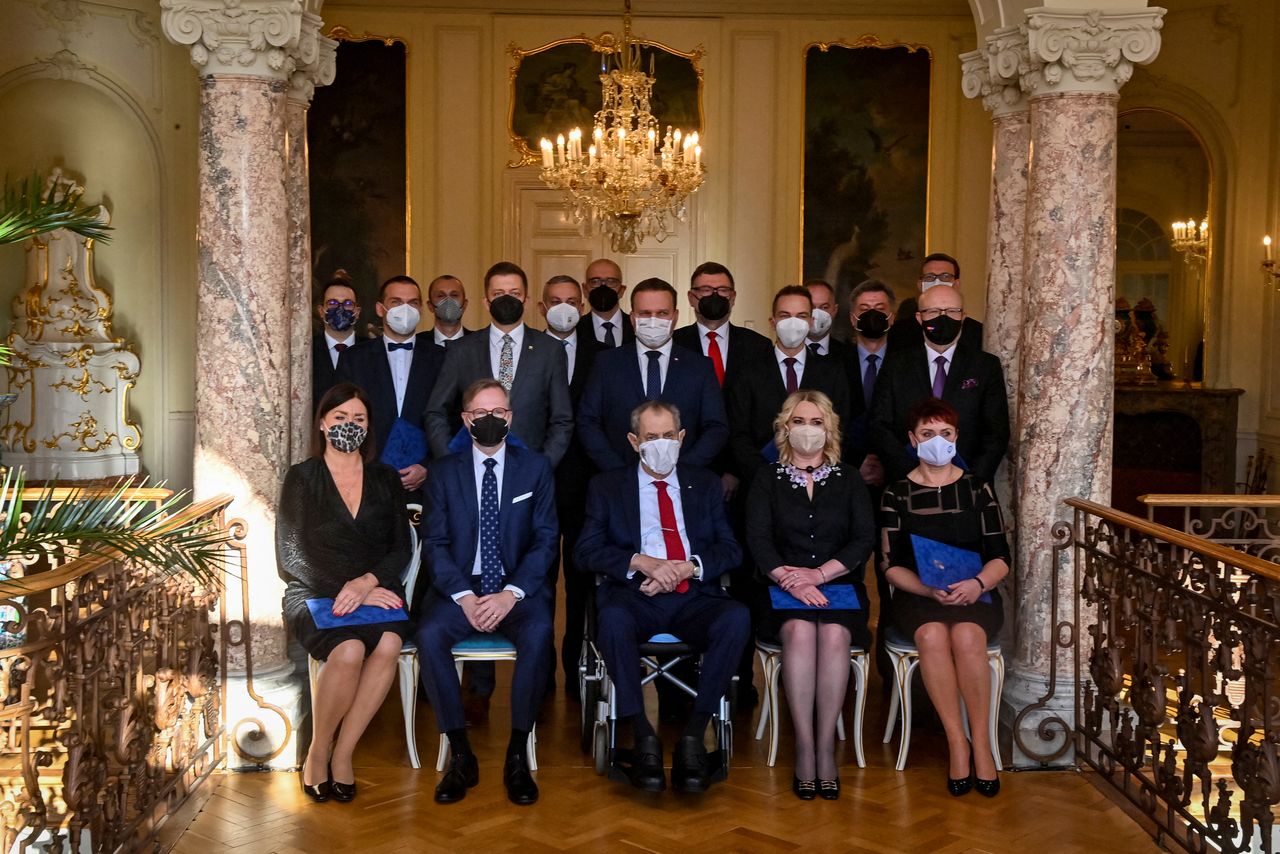 Czech President Milos Zeman poses for a picture with new?Czech?cabinet members at the Lany Chateau, Czech Republic December 17, 2021. Vit Simanek/Pool via REUTERS