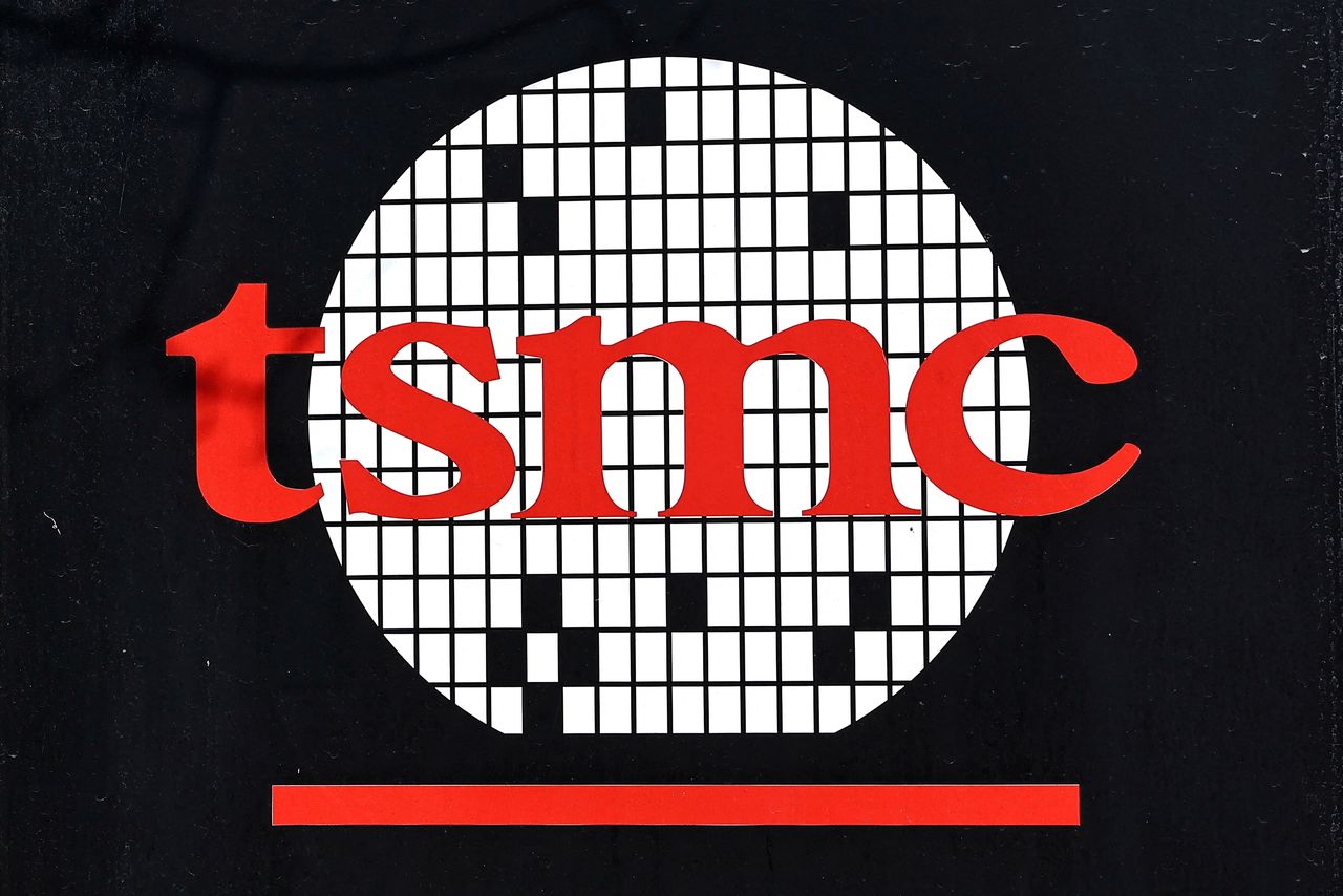 FILE PHOTO: The logo of Taiwan Semiconductor Manufacturing Co (TSMC) is pictured at its headquarters, in Hsinchu, Taiwan, January 19, 2021. REUTERS/Ann Wang