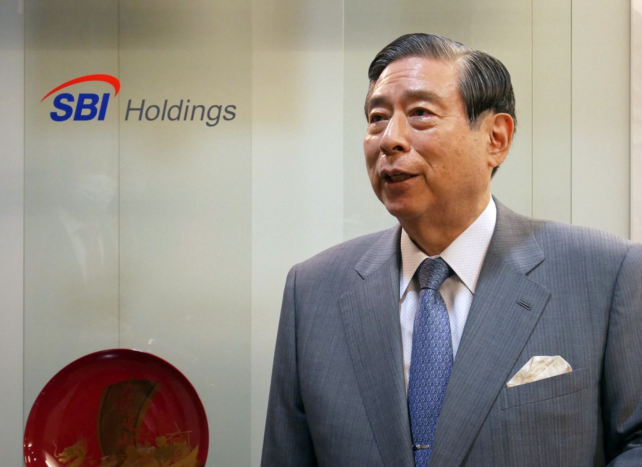 FILE PHOTO: SBI Holdings CEO Yoshitaka Kitao speaks during an interview with Reuters in Tokyo, Japan July 7, 2020. REUTERS/Junko Fujita