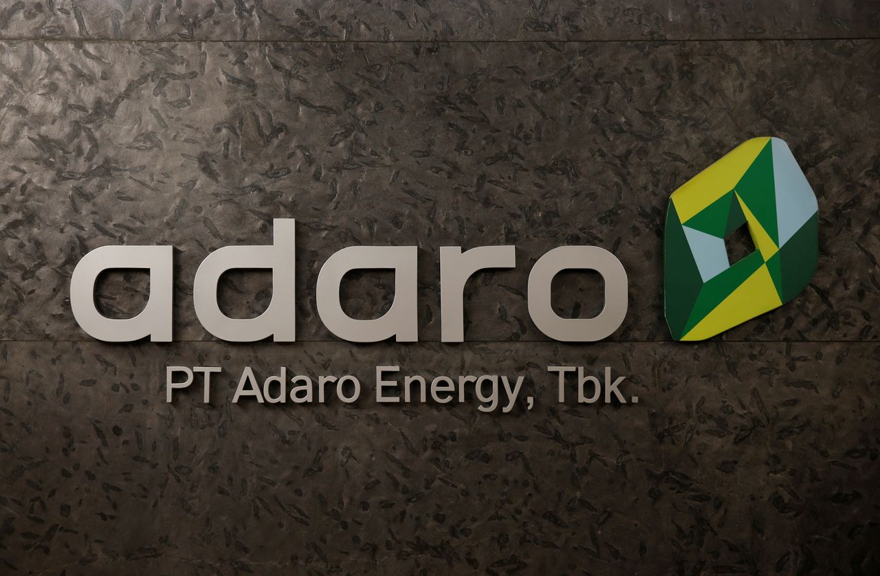 FILE PHOTO: The logo of PT Adaro Energy as seen at PT Adaro Energy headquarters in Jakarta, Indonesia, October 20, 2017. REUTERS/Beawiharta