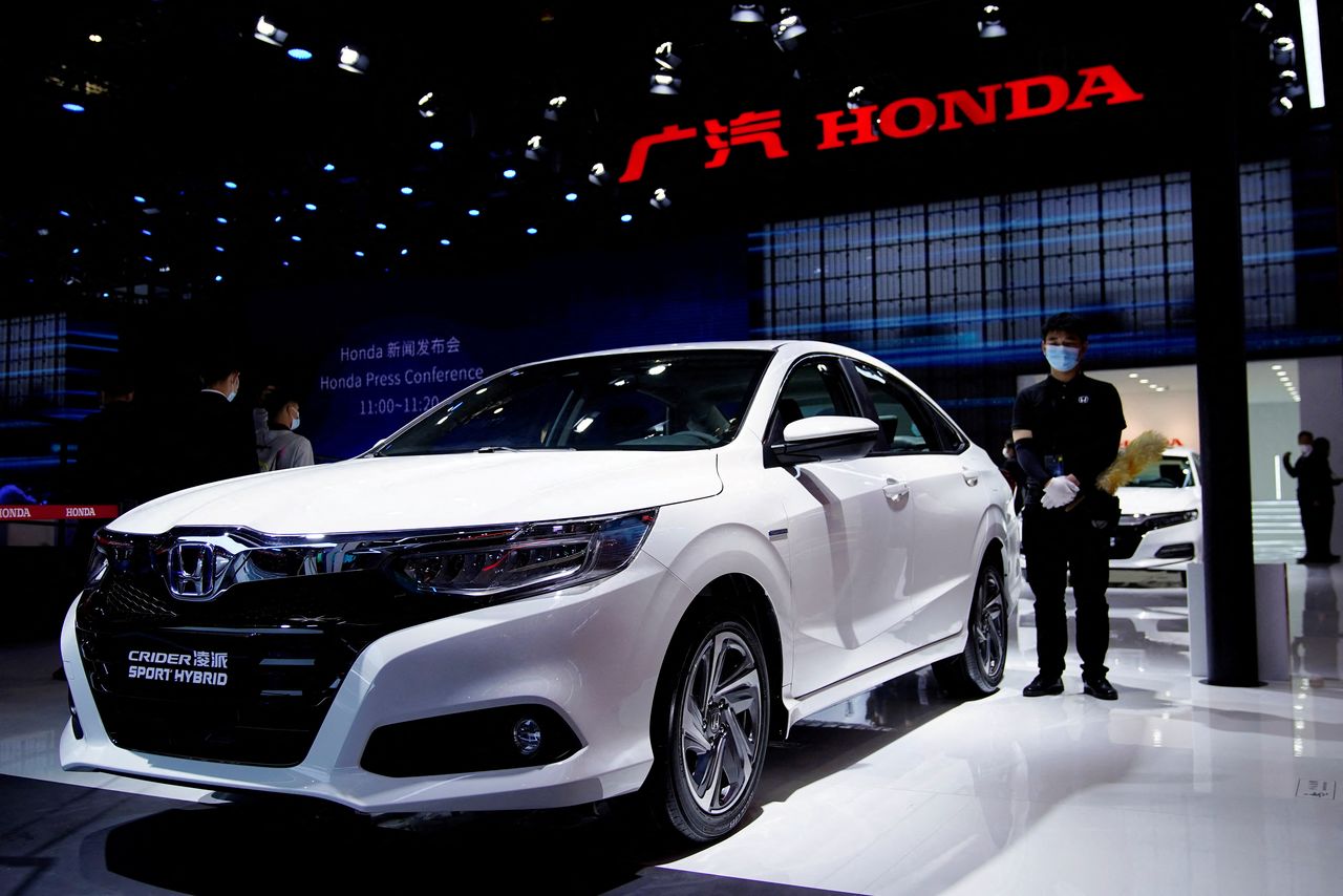 FILE PHOTO: A Honda Crider Sport Hybrid vehicle is seen displayed at the GAC Honda booth during a media day for the Auto Shanghai show in Shanghai, China April 19, 2021. REUTERS/Aly Song/File Photo