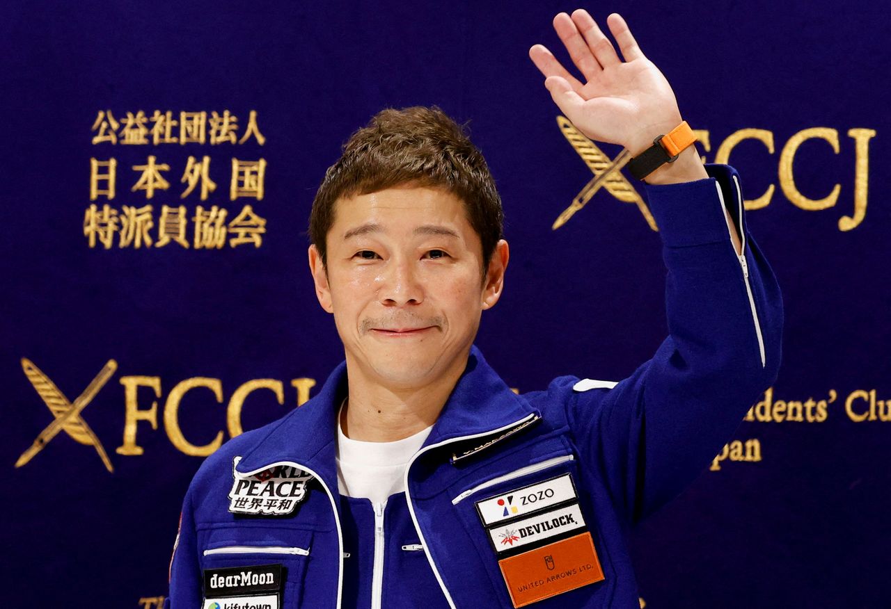 Japanese billionaire Yusaku Maezawa, who returned to Earth last month after a 12-day journey into space, attends a news conference after returning to Japan, at the Foreign Correspondents