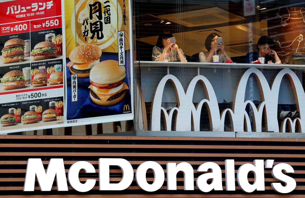 FILE PHOTO: Customers are seen at a McDonald