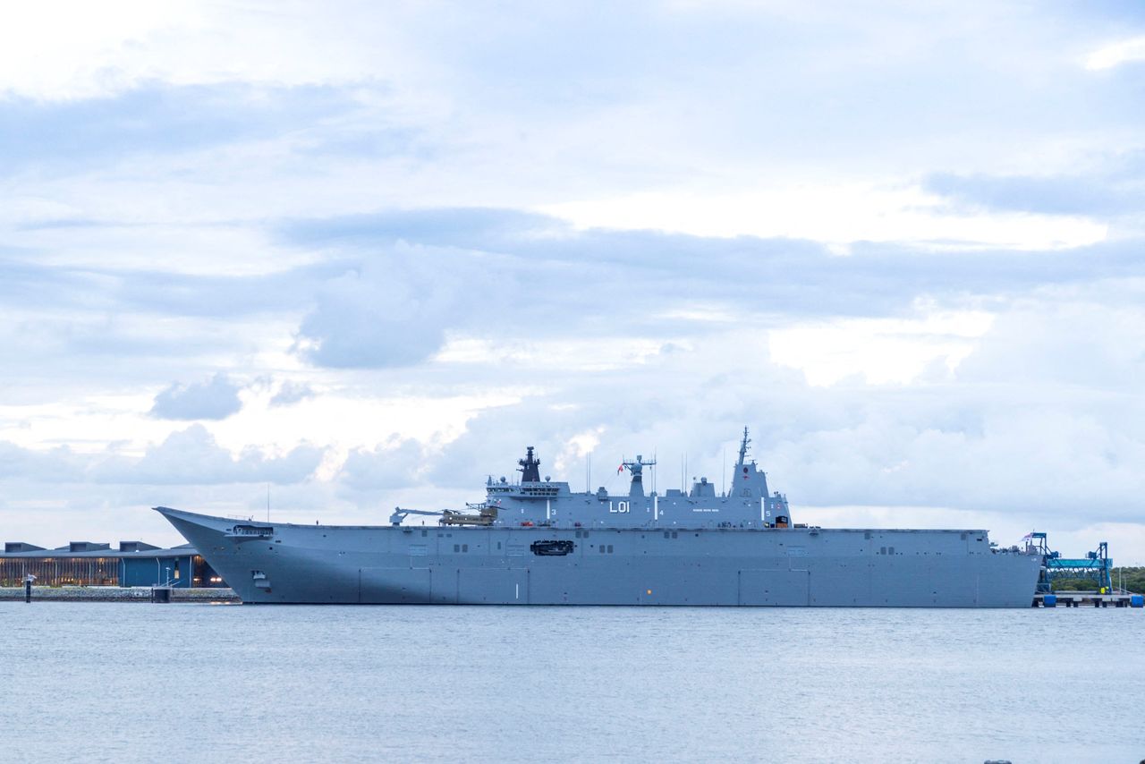 HMAS Adelaide in Brisbane before travelling to Tonga to assist in relief efforts, January 19, 2022. Australian Department of Defence/Handout via REUTERS