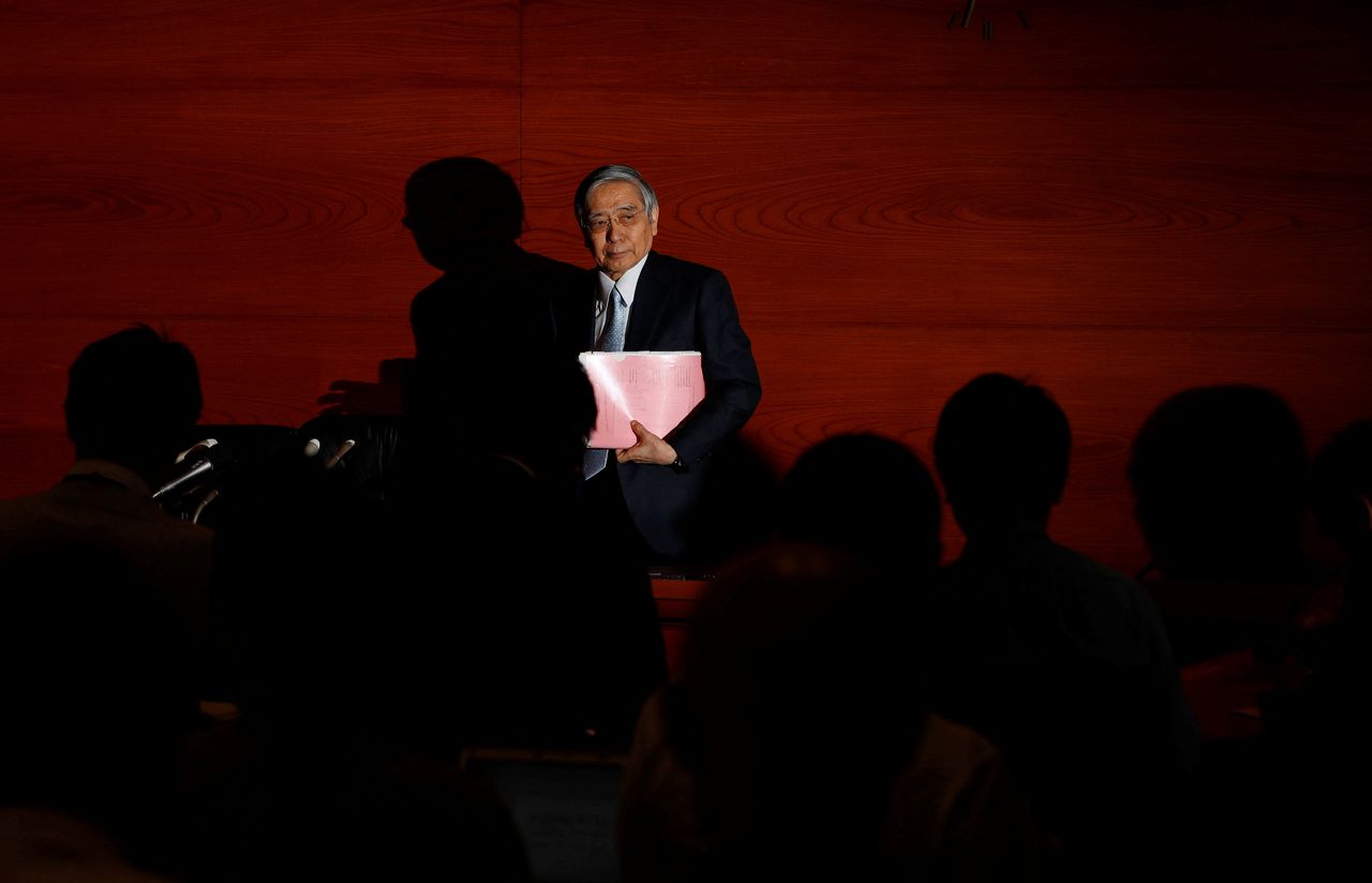 FILE PHOTO: Bank of Japan (BOJ) Governor Haruhiko Kuroda leaves after a news conference at the BOJ headquarters in Tokyo, Japan July 30, 2019. REUTERS/Kim Kyung-Hoon