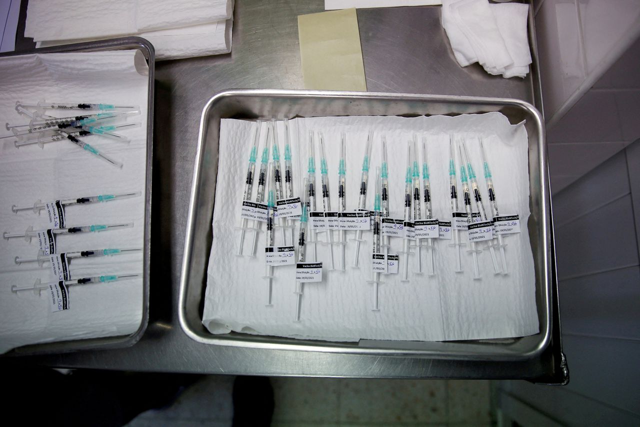 FILE PHOTO: Pfizer-BioNTech coronavirus disease (COVID-19) vaccines are seen at Sao Jose Hospital in Lisbon, Portugal, January 19, 2021. REUTERS/Pedro Nunes