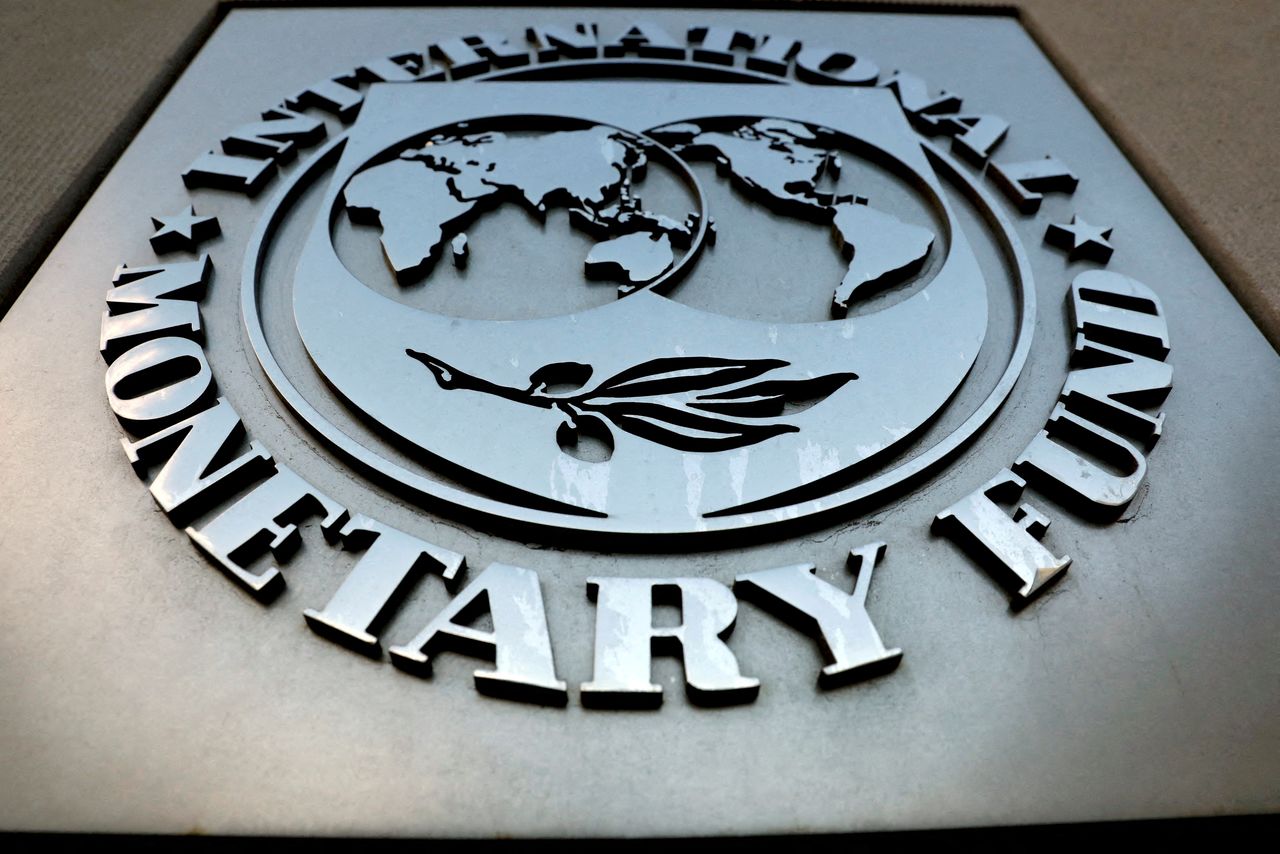 FILE PHOTO: The International Monetary Fund (IMF) logo is seen outside the headquarters building in Washington, U.S., September 4, 2018. REUTERS/Yuri Gripas