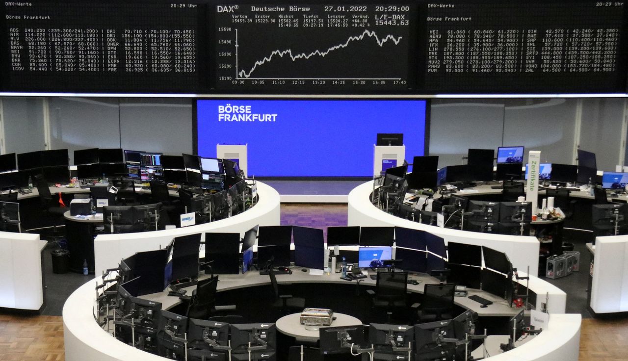 FILE PHOTO: The German share price index DAX graph is pictured at the stock exchange in Frankfurt, Germany, January 27, 2022.    REUTERS/Staff