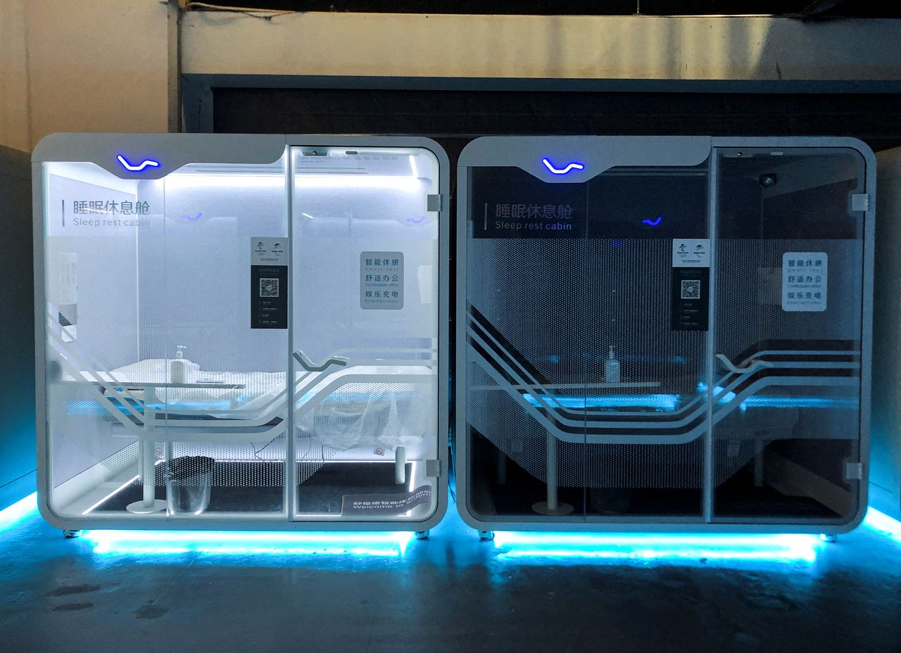 Two sleeping cabins are seen in the 2022 Winter Olympics main media centre in Beijing, China, January 30, 2022. REUTERS/Angie Teo