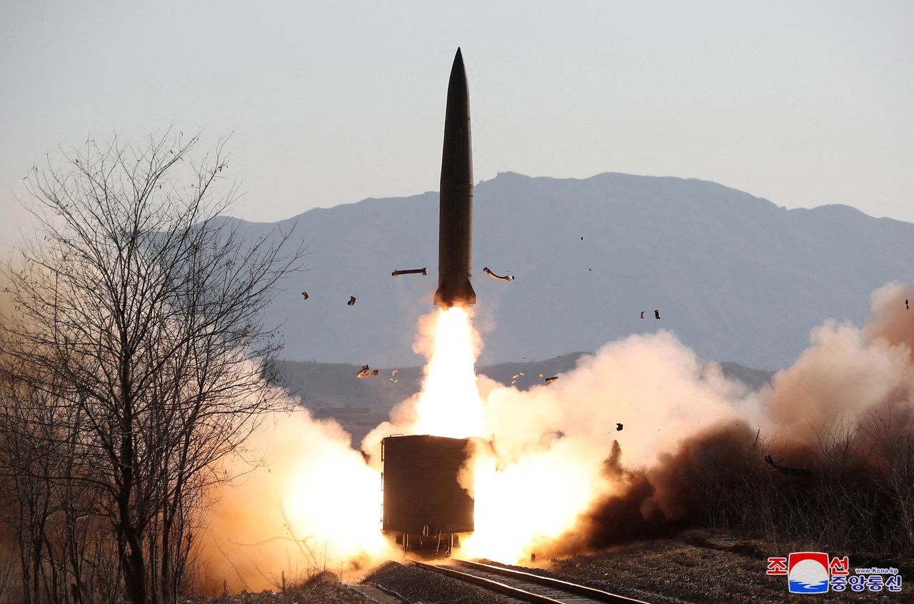 FILE PHOTO: A railway-born missile is launched during firing drills according to state media, at an undisclosed location in North Korea, in this photo released January 14, 2022 by North Korea