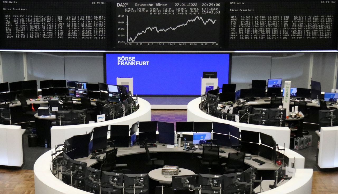 FILE PHOTO: The German share price index DAX graph is pictured at the stock exchange in Frankfurt, Germany, January 27, 2022. REUTERS/Staff