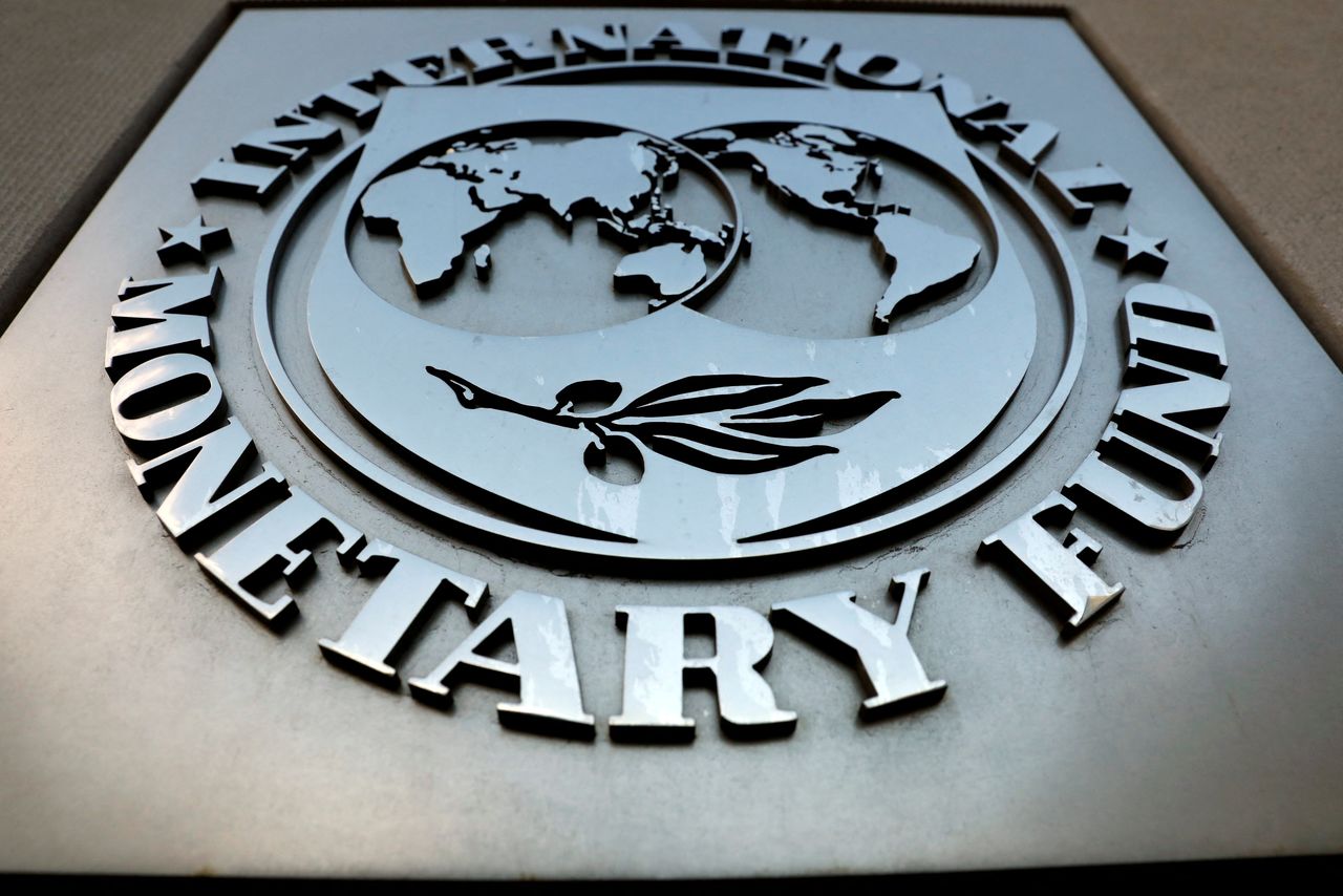 FILE PHOTO: The International Monetary Fund (IMF) logo is seen outside the headquarters building in Washington, U.S. September 4, 2018. REUTERS/Yuri Gripas