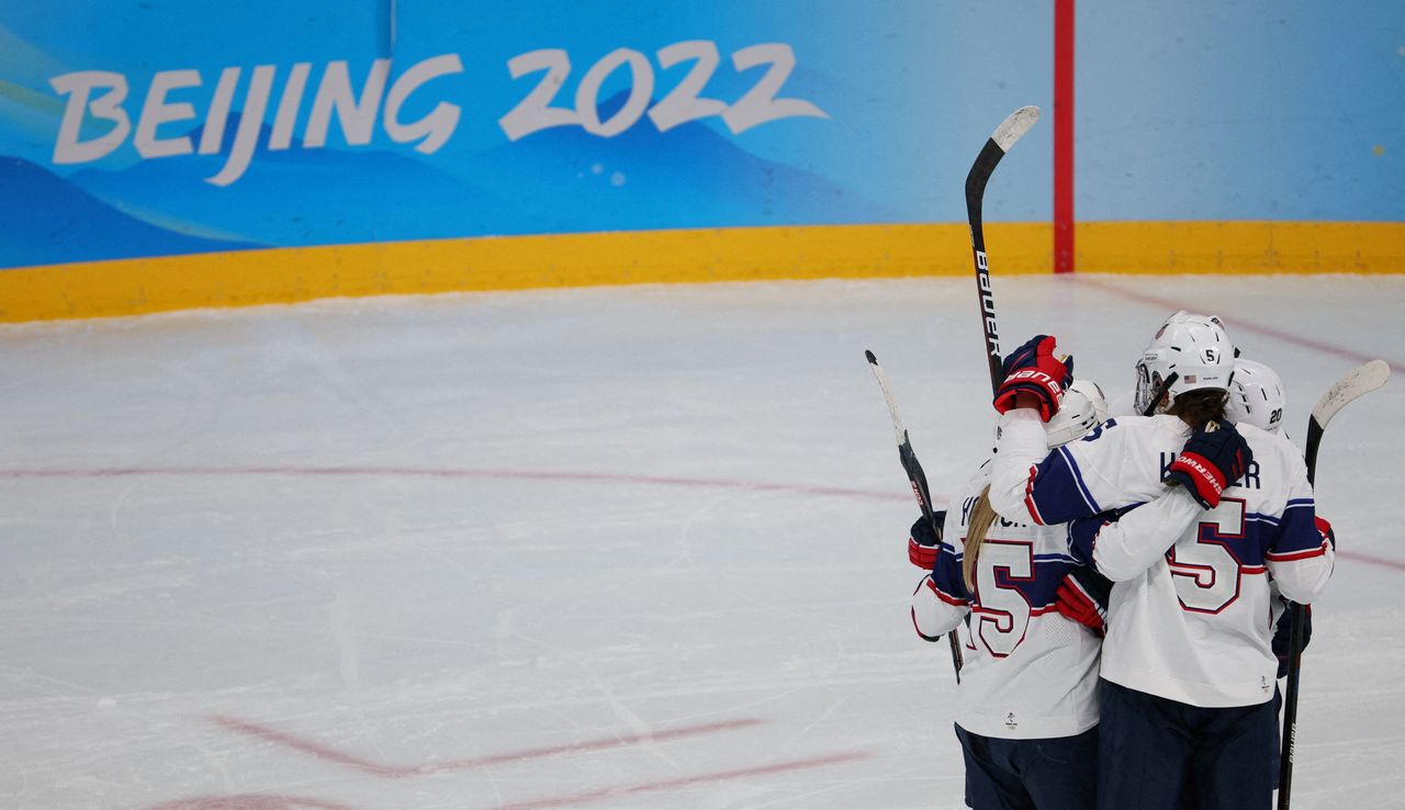 2022 Beijing Olympics - Ice Hockey at Wukesong Sports Centre, Beijing, China - February 3, 2022. Kendall Coyne Schofield of United States celebrates scoring their third goal against Finland with teammates. REUTERS/Brian Snyder