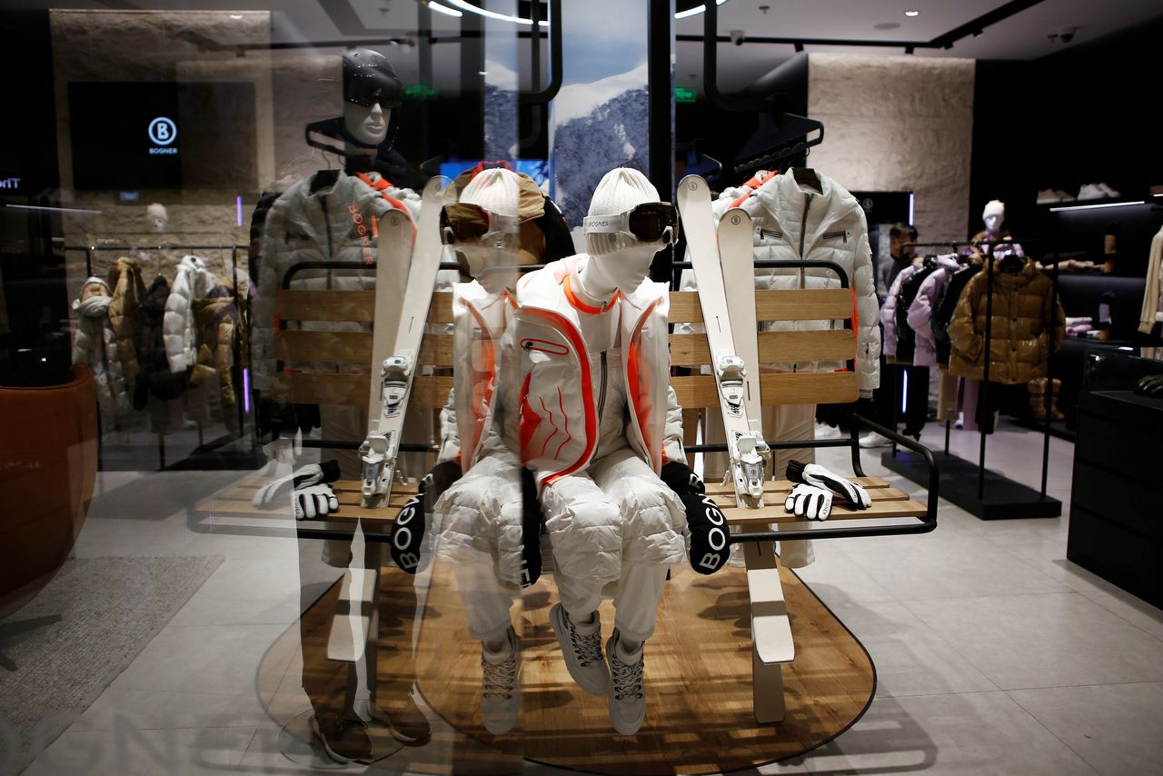 A mannequin sits on a ski lift at a Bogner store inside a shopping mall in Beijing, China December 23, 2021. Picture taken December 23, 2021. REUTERS/Florence Lo