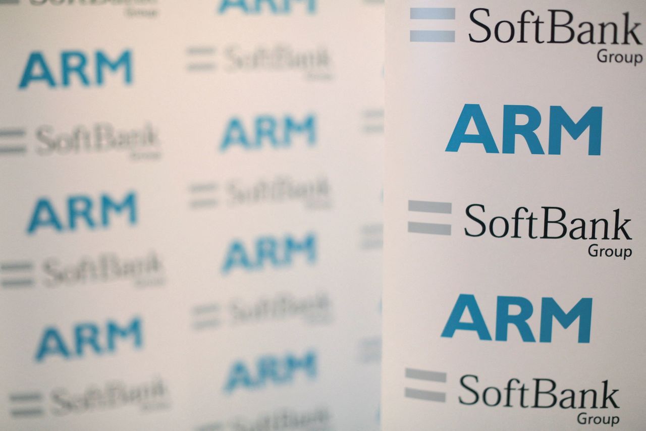 FILE PHOTO: An ARM and SoftBank Group branded board is displayed at a news conference in London, Britain July 18, 2016. REUTERS/Neil Hall/File Photo