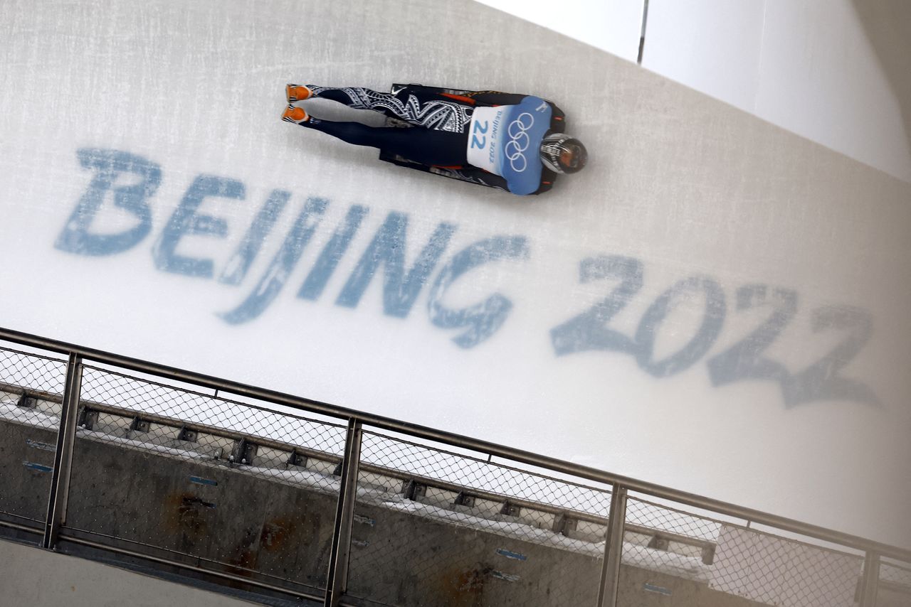 2022 Beijing Olympics - Skeleton - Men Heat 2 - National Sliding Centre, Beijing, China - February 10, 2022. Nathan Crumpton of American Samoa in action. REUTERS/Thomas Peter