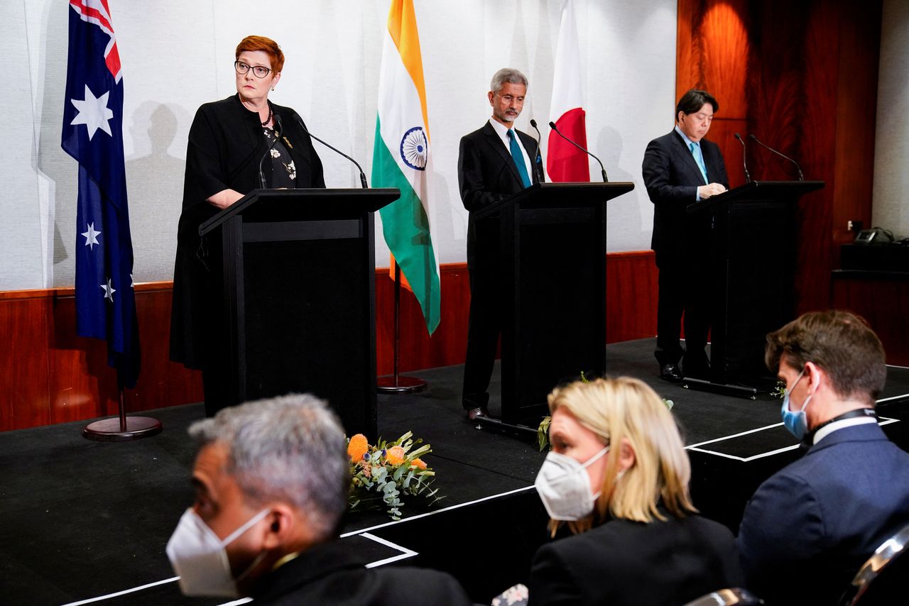 Australian Foreign Minister Marise Payne, Indian Foreign Minister Subrahmanyam Jaishankar and Japanese Foreign Minister Yoshimasa Hayashi during a press conference of the Quadrilateral Security Dialogue (Quad) foreign ministers in Melbourne, Australia, February 11, 2022. Sandra Sanders/Pool via REUTERS