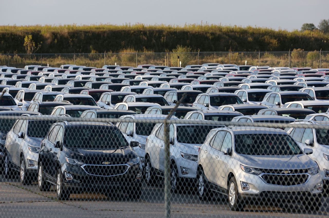 FILE PHOTO: Chevrolet Equinox SUVs are parked awaiting shipment next to the General Motors Co (GM) CAMI assembly plant in Ingersoll, Ontario, Canada October 13, 2017. REUTERS/Chris Helgren
