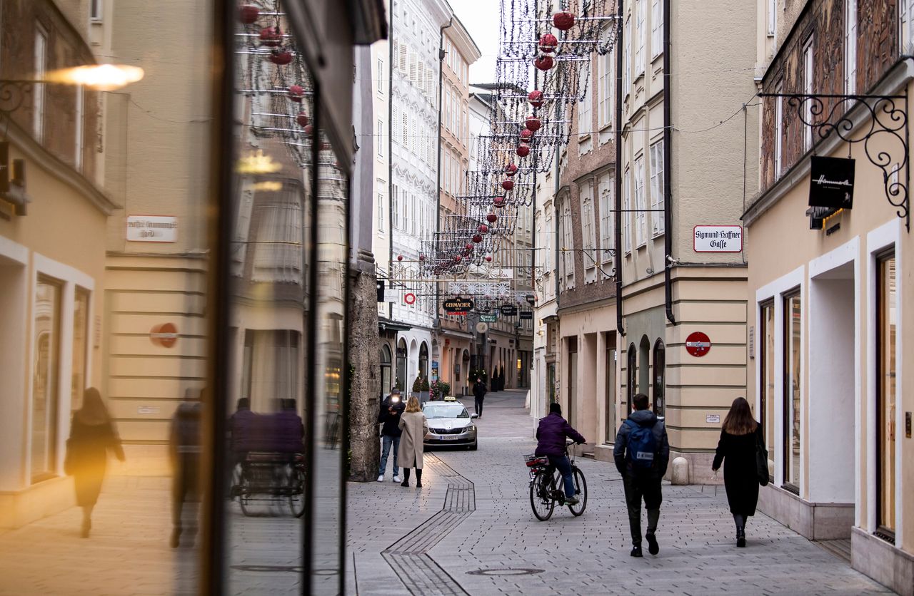 FILE PHOTO: Pedestrians walk at the city centre during the coronavirus disease (COVID-19) outbreak, as Austria