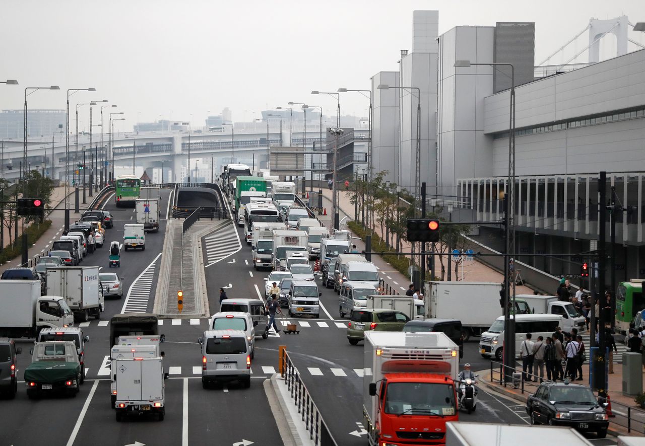 FILE PHOTO: A traffic jam is seen in front of the new Toyosu market, which has been relocated from Tsukiji market,  on its opening day, in Tokyo, Japan, October 11, 2018.   REUTERS/Issei Kato