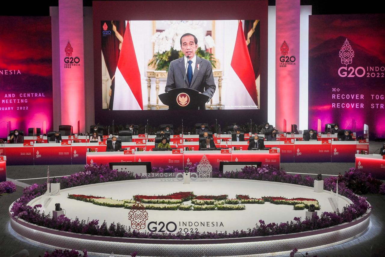 Indonesia President Joko Widodo is seen on a screen delivering his speech during G20 finance ministers and central bank governors meeting (FMCBG) at Jakarta Convention Center, Jakarta, Indonesia, February 17, 2022. Hafidz Mubarak A /Pool via REUTERS