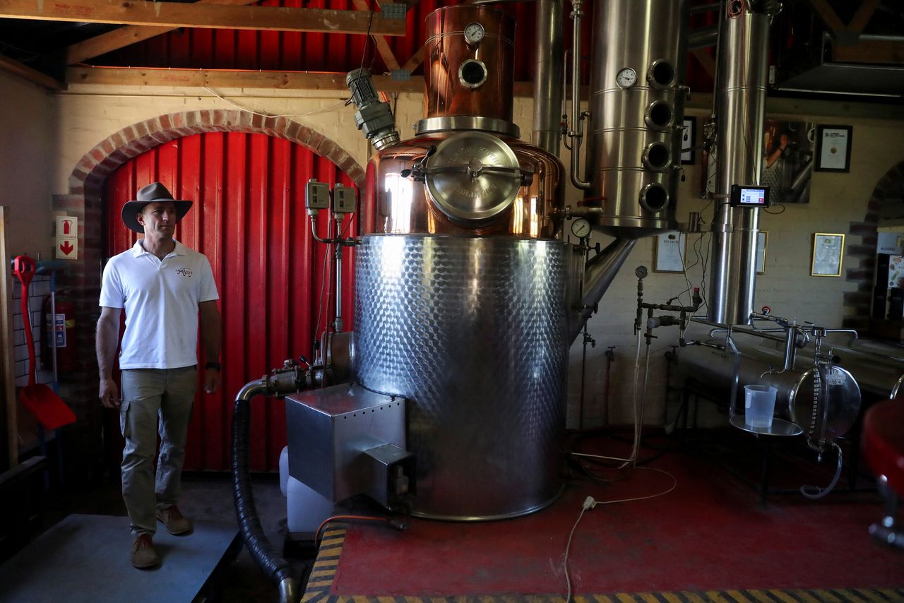 Les Ansley, owner of Indlovu Gin, walks through the distillery where his premium craft gin is manufactured, in Paarl, near Cape Town, South Africa, January 28, 2022. REUTERS/Sumaya Hisham