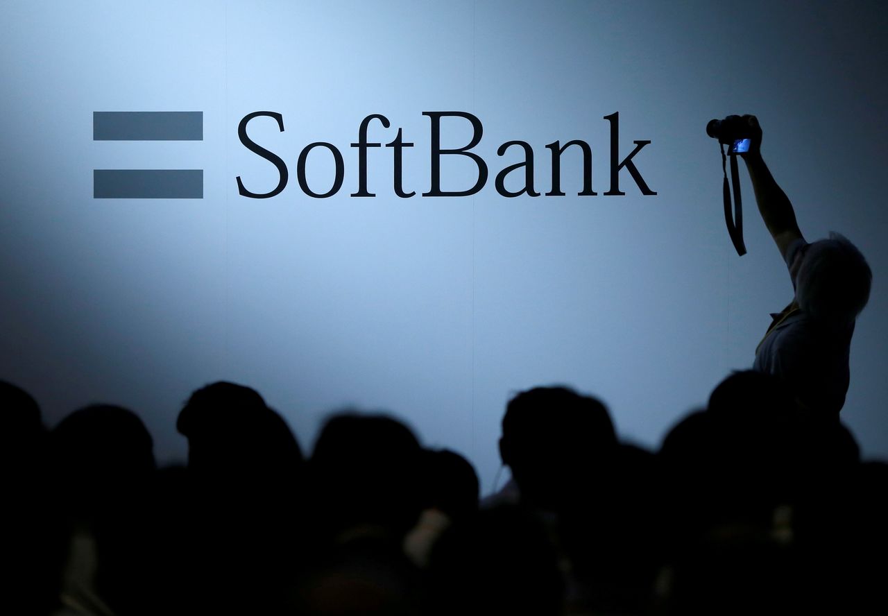 FILE PHOTO: The logo of SoftBank Group Corp is displayed at SoftBank World 2017 conference in Tokyo, Japan, July 20, 2017. REUTERS/Issei Kato
