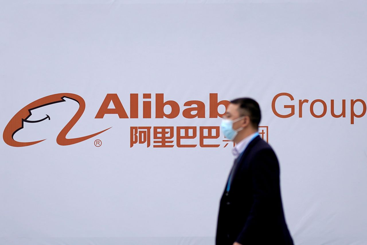 FILE PHOTO: A logo of Alibaba Group is seen during the World Internet Conference (WIC) in Wuzhen, Zhejiang province, China, Nov. 23, 2020. REUTERS/Aly Song/File Photo