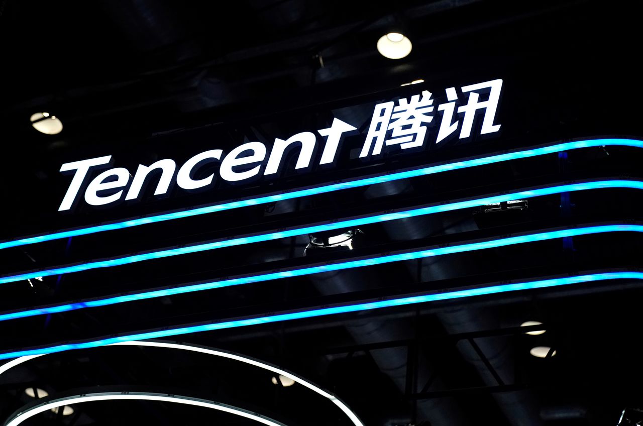 FILE PHOTO: A logo of Tencent is seen at its booth at the 2020 China International Fair for Trade in Services (CIFTIS) in Beijing, China September 4, 2020. REUTERS/Tingshu Wang