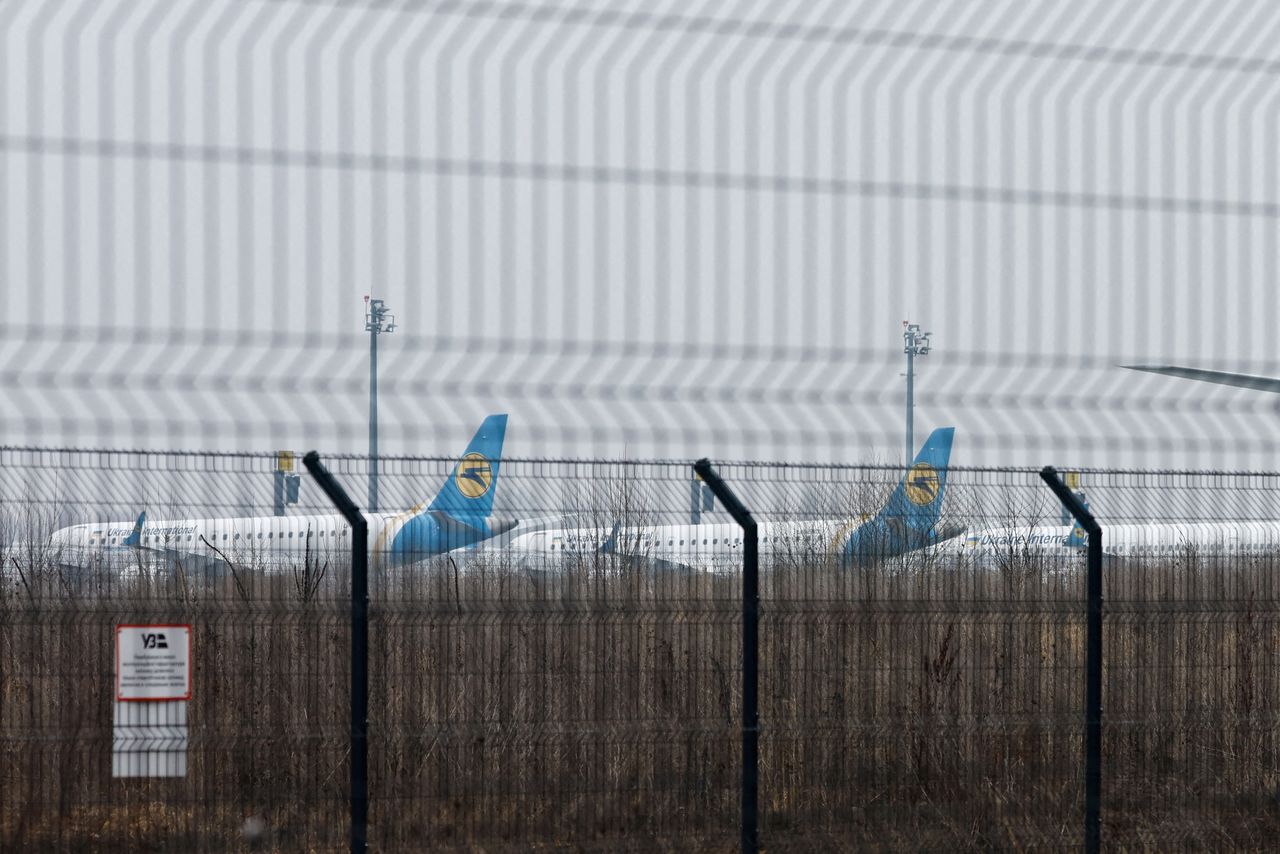 Parked planes are seen at Boryspil International Airport after Russia launched a massive military operation against Ukraine, in Boryspil, Ukraine February 24, 2022. REUTERS/Umit Bektas