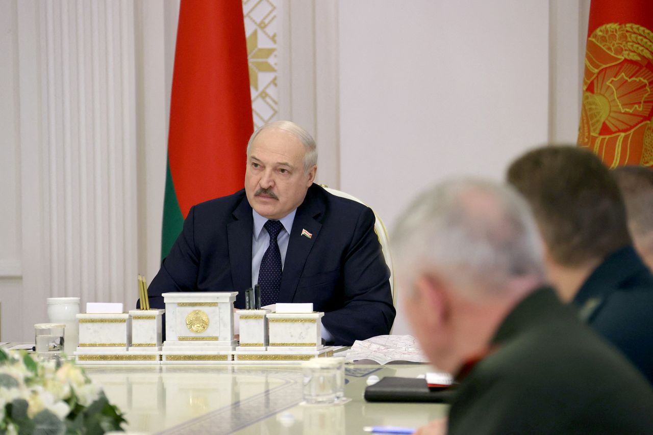 FILE PHOTO: Belarusian President Alexander Lukashenko chairs a meeting with military officials in Minsk, Belarus February 24, 2022. Nikolay Petrov/BelTA/Handout via REUTERS/File Photo