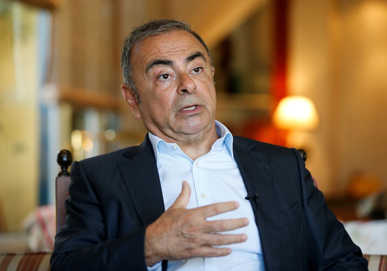 FILE PHOTO: Fugitive former car executive Carlos Ghosn, gestures as he talks during an interview with Reuters in Beirut, Lebanon June 14, 2021. REUTERS/Mohamed Azakir