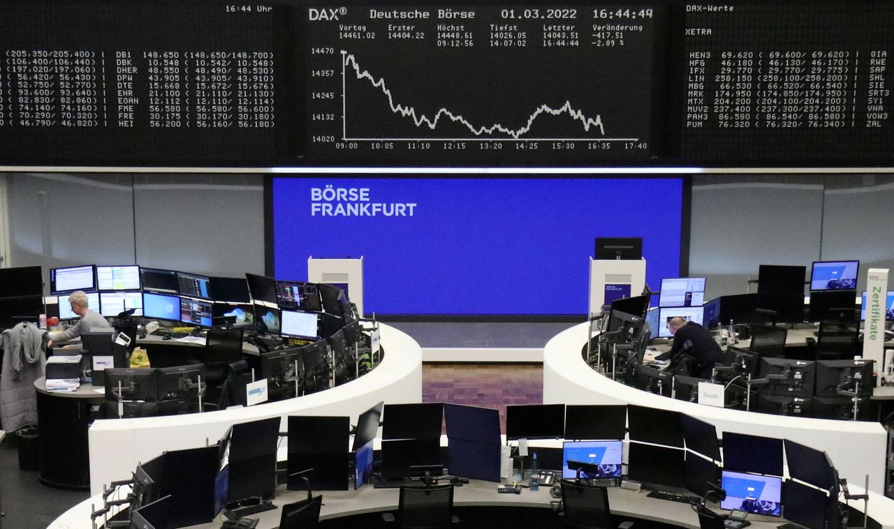 FILE PHOTO: The German share price index DAX graph is pictured at the stock exchange in Frankfurt, Germany, March 1, 2022. REUTERS/Staff