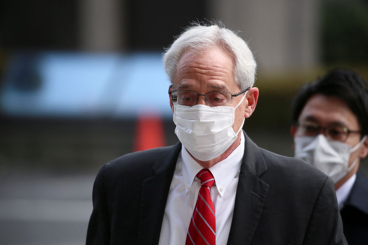Greg Kelly, former executive of Nissan Motor Co., walks in to the Tokyo District Court, in Tokyo, Japan, March 3, 2022. Zhang Xiaoyu/Pool via REUTERS