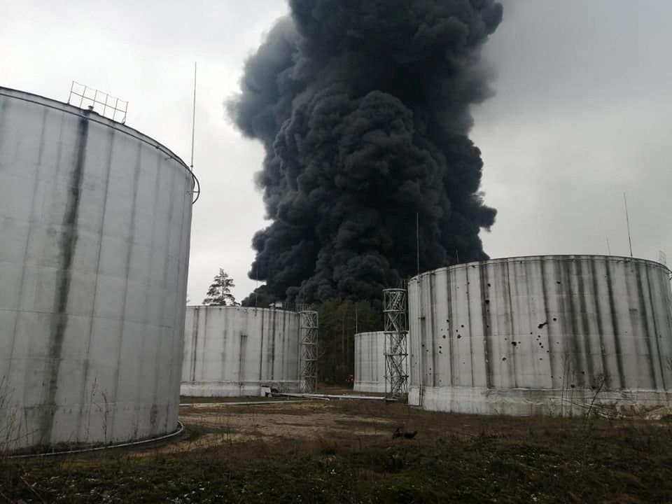 Smoke rises from the oil depot, which, according to local authorities, was damaged by shelling in Chernihiv, Ukraine, in this handout picture released March 3, 2022. Press service of the Ukrainian State Emergency Service/Handout via REUTERS ATTENTION EDITORS - THIS IMAGE HAS BEEN SUPPLIED BY A THIRD PARTY.