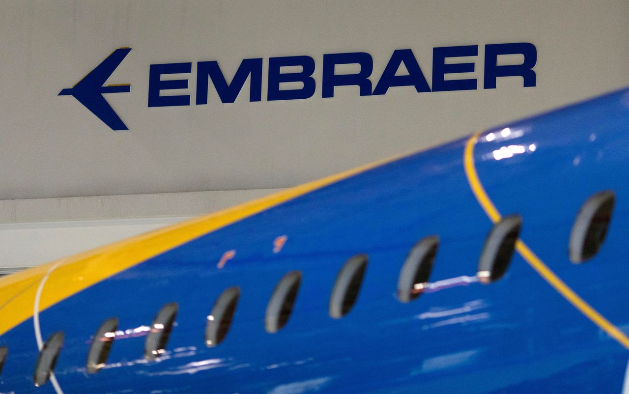 FILE PHOTO: The logo of Brazilian planemaker Embraer SA is seen at the company
