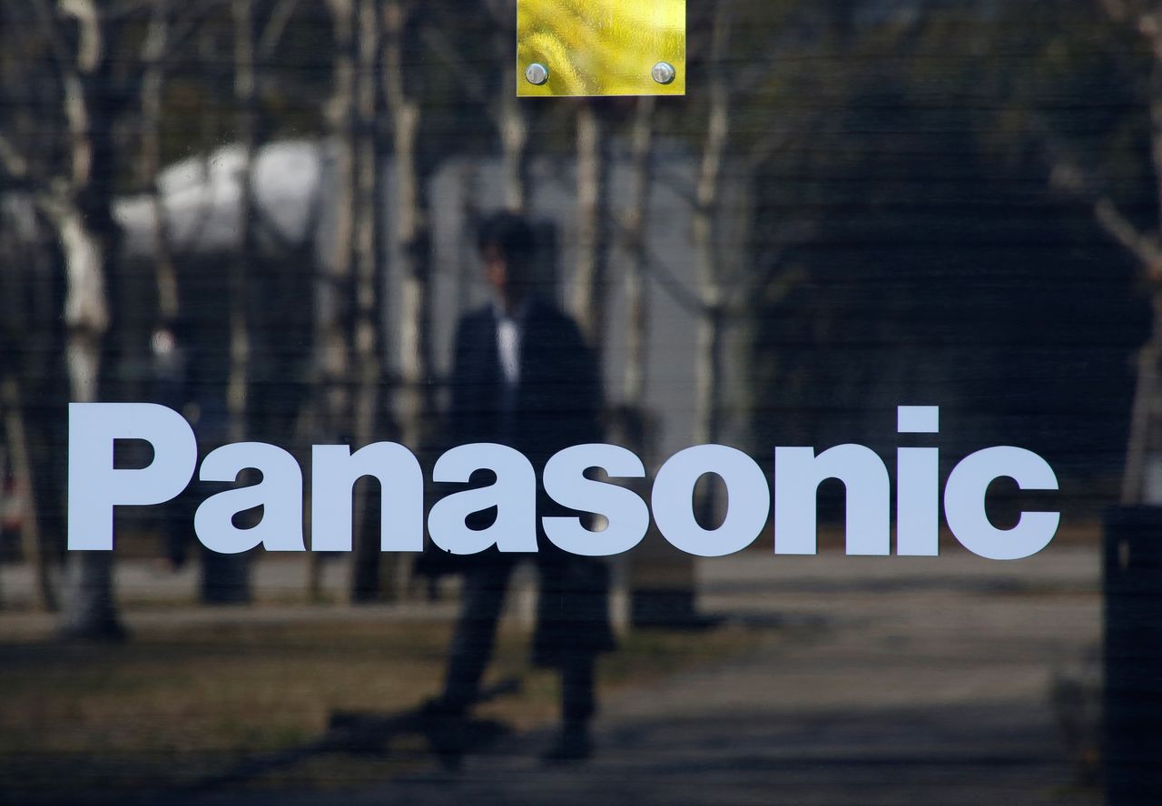 A man is reflected on Panasonic Corp