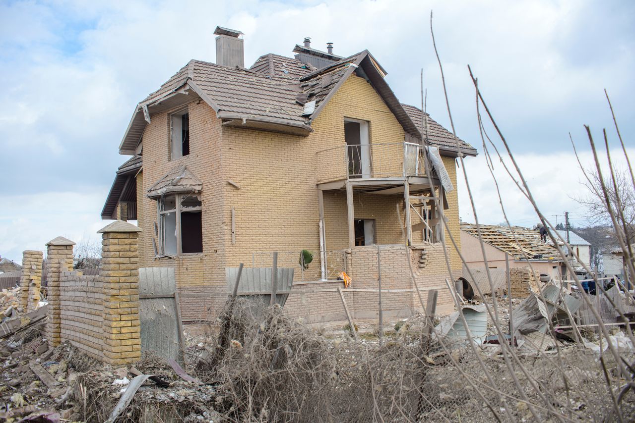 A house damaged by shelling, amid Russia