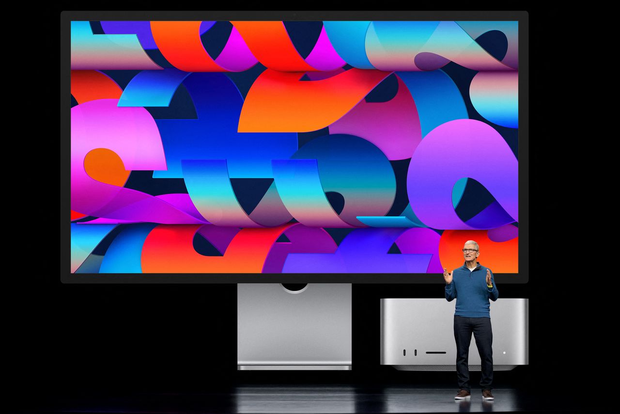 Apple CEO Tim Cook unveils the all-new Mac Studio and Studio Display during a special event at Apple Park in Cupertino, California, U.S. broadcast on March 8, 2022. Brooks Kraft/Apple Inc./Handout via REUTERS.